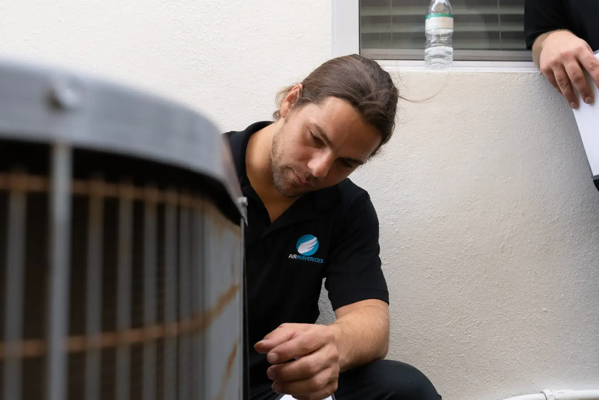 a long haired ac technician from air mavericks